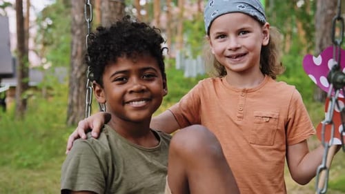 Happy Children Together Outdoors in a Garden