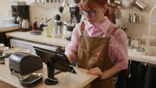 Portrait of Red-haired Barista or Waitress Working at Coffee Shop