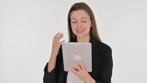 Woman Using Tablet for Video Call Indoors