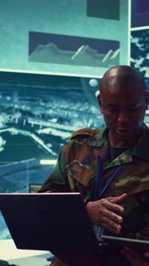 Vertical Video Special Operations Engineers Examine Surveillance Footage to Gather Information
