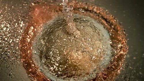 Juicy freshness explosion. Healthy natural juice splashing in extreme slow-motion. Dramatic close-up