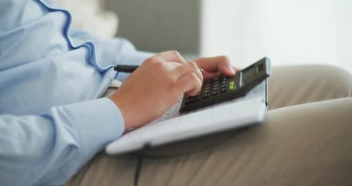 Businessman Calculates Household Expenses