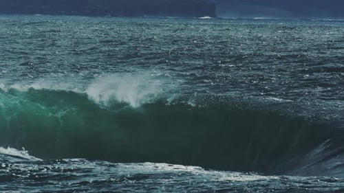 Wave Crashes in Deep Water With Mist and Sea Foam, Dark Ocean Backdrop