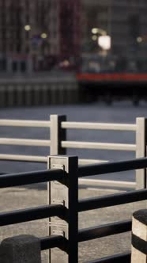 A Row of Benches Sitting Next to a Body of Water