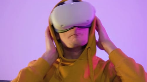 Young Adult Wearing Virtual Reality Headset