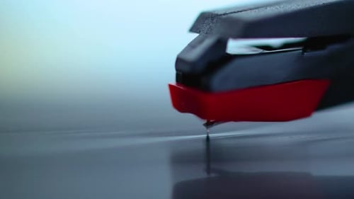 Close up shot of gramophone needle scratching vinyl