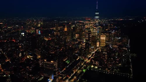 Glamorous New York scenery at night. Metropolis shining with billions of lights. Aerial view.