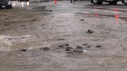 street flooding closes road -