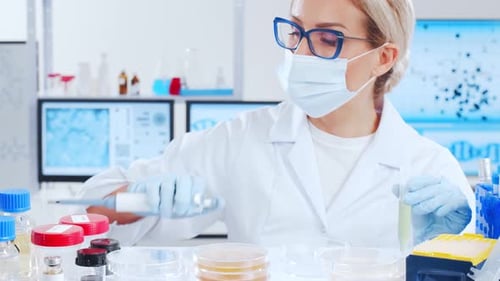 Female Scientist Working in Medical Research Laboratory