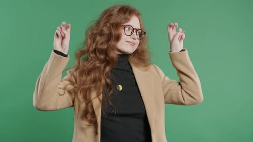 Sarcastic BusinessWoman Hands Two Fingers Air Quotes Gesture on Green Sarcasm