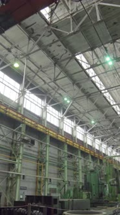 This is a Spacious Industrial Warehouse That Comes with High Ceilings and Ample Skylights Stock Clip