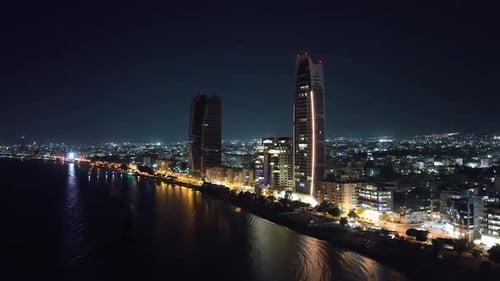 Aerial Night Views of Cyprus Cityscape with Illuminated Skyscrapers