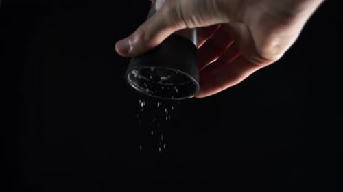 Salt Mill on a Black Background 2K