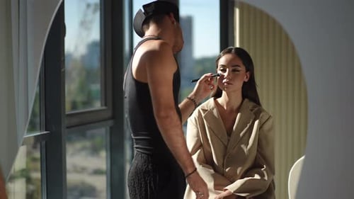 Professional Makeup Application in a Contemporary Studio with Elegance and Style