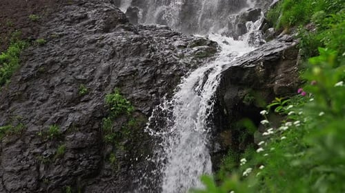 A Beautiful Tropical Waterfall Water From a Mountain River Falls Down the Stone Cascades Pure Water