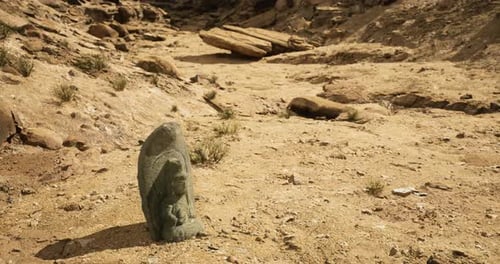 Ancient Stone Carving Located in a Desert Area Showcasing Cultural Heritage
