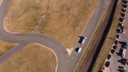 Breakdown of a racecar being towed at Autodromo Buenos Aires aerial