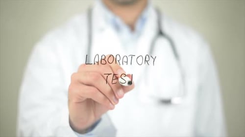 Doctor Writes Laboratory Test with Marker