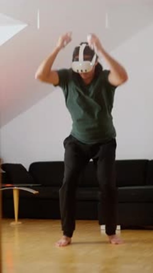 Man Using VR Headset for Virtual Reality Fitness