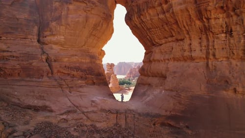 Traveling to Saudi Arabia Woman Tourist Walks By the Rocks in AlUla