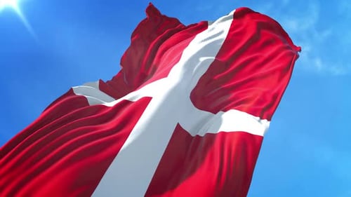 Realistic Denmark Flag Waving Against a Clear Blue Sky