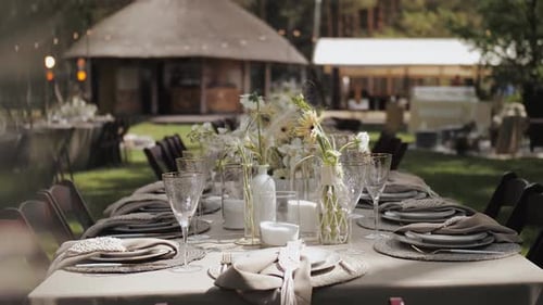 Dining Table Setting Wedding Table Setting Close Up of Decorations Flowers Candles Glass Romantic