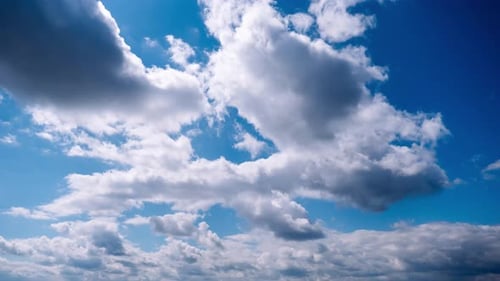 Timelapse of Cumulus Clouds Moves in the Blue Sky