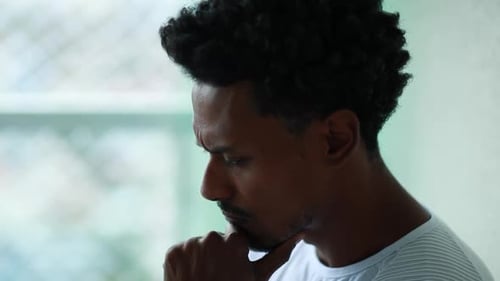 Man Thinking Profile Close Up Portrait in Home Setting