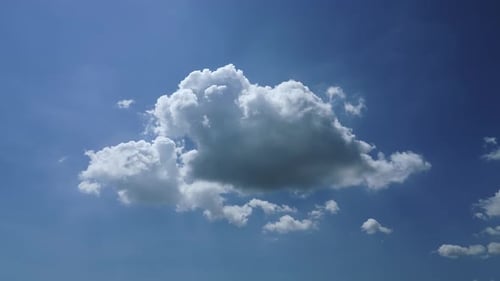 White Clouds Drifting Across a Blue Sky