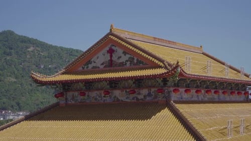 Kek Lok Si's temple, Chinese architecture roof on sunny day pan right