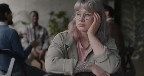 Woman Attending Group Therapy Session