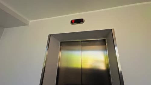 Modern Elevator Interior Design Featuring an Illuminated Indicator Light for Enhanced User