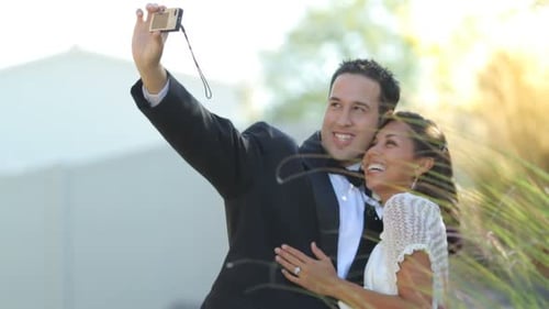 Happy Couple Taking Selfie on Wedding Day