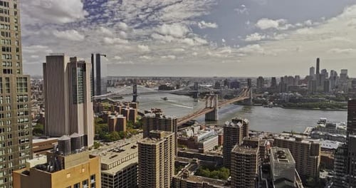 NYC New York Aerial v403 drone fly through Lower Manhattan's financial district, capturing two bridg