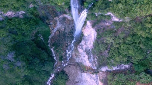 Aerial View Waterfall of Mountain Falling in Green Nature of Forest Landscape