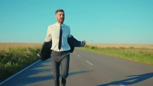 Shot of Businessman Runs Removes the Jacket Country Road Near a Wheat Field Freedom Concept Outdoors