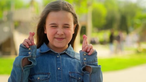 Caucasian Child Little Girl Schoolgirl Crossing Fingers Hope Adopted Kid Female Orphan Wish Happy