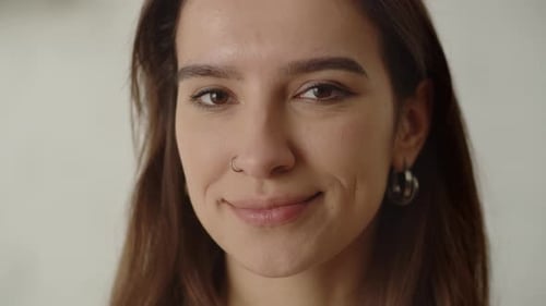 Woman Smiling in Close Up Portrait