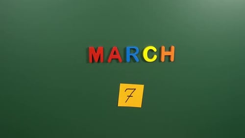 Hand sticking a sticker 7 March calendar day on school board. 7 date of March. Seventh day March