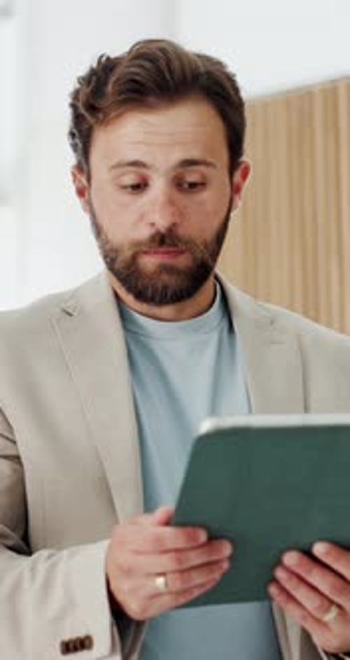 Investor, talking and man in meeting, tablet for investment deal or app for stock market info