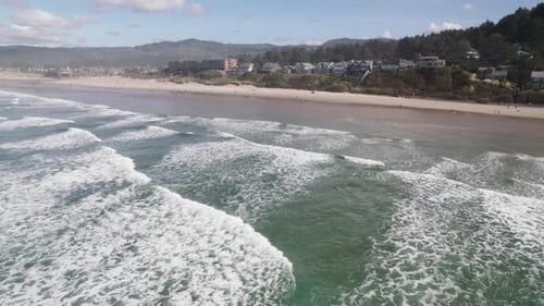 Ocean waves reach the shoreline on the Pacific Coast