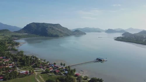 Drone shot of water tourism in Langkawi with bright sky, Malaysia
