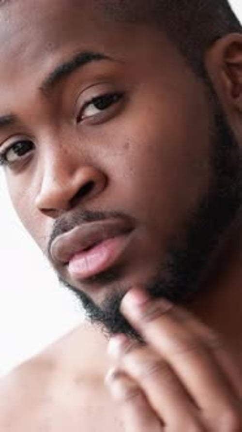 Attractive Man Poses in a Close Up Portrait