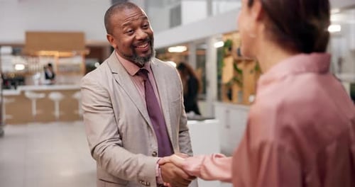 Business, people and welcome handshake for meeting in hotel lobby with introduction