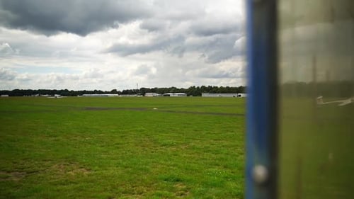 a small airfield with meadow