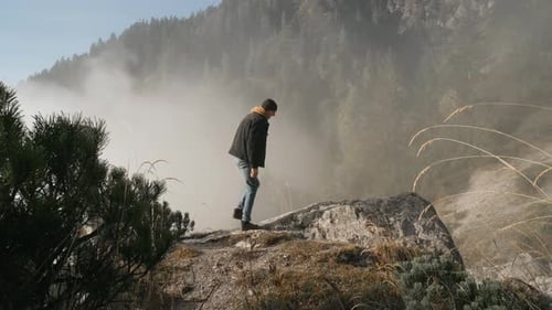 Couple Hiking in Misty Mountains