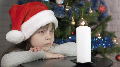 Upset Child By Burning Candle
