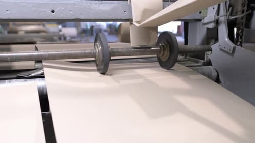 Machine with Rollers for Removing Defects on Cardboard Sheets