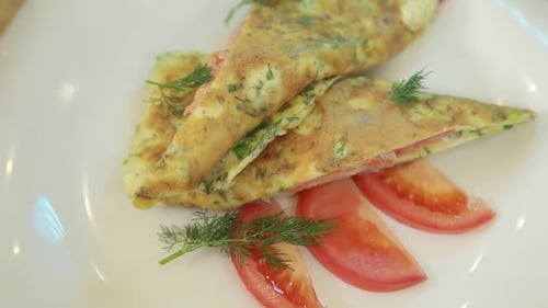 Delicious Omelet with Dill and Fresh Tomato Slices
