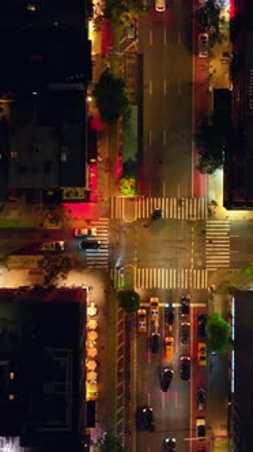 Crossroads at the streets of New York. Numerous cars moving by the motorways.